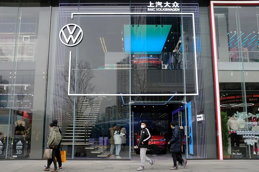 People walk past an ID. Store X showroom of SAIC Volkswagen in Chengdu, Sichuan province, China, 10 January 2021. (Yilei Sun/File Photo/Reuters)