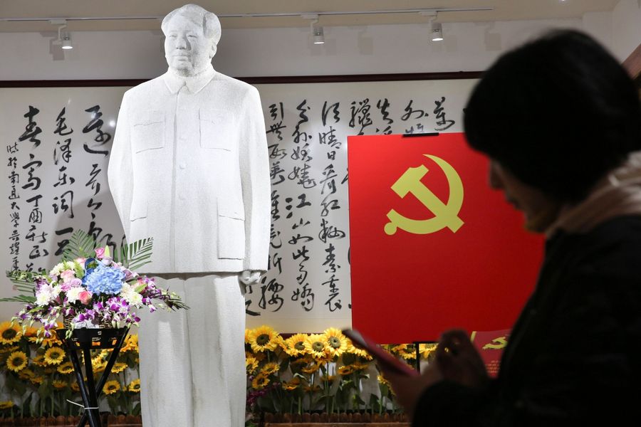 China is shaped by the secular religion of communism. In this photo taken on 26 December 2019, people visit a museum of artworks of the late former Chinese Communist Party leader Mao Zedong to mark his 126th birthday, in Nantong, Jiangsu. (STR/AFP)