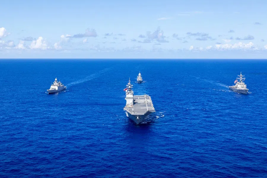 Japan Maritime Self-Defense Force Hyuga-class helicopter destroyer, JS Hyuga, leads US Navy Arleigh Burke-class destroyer, USS Fitzgerald (centre-right), Indian Navy Shivalik-class frigate, INS Sahyadri (centre-left), and Royal Australian Navy Anzac-class frigate, HMAS Ballarat, during Exercise MALABAR 25, held between 10 and 18 November, off the coast of Guam.