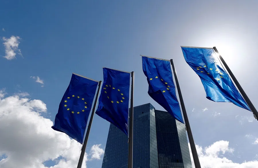 EUn flags flutter outside the European Central Bank headquarters in Frankfurt, Germany, on 26 April 2018.