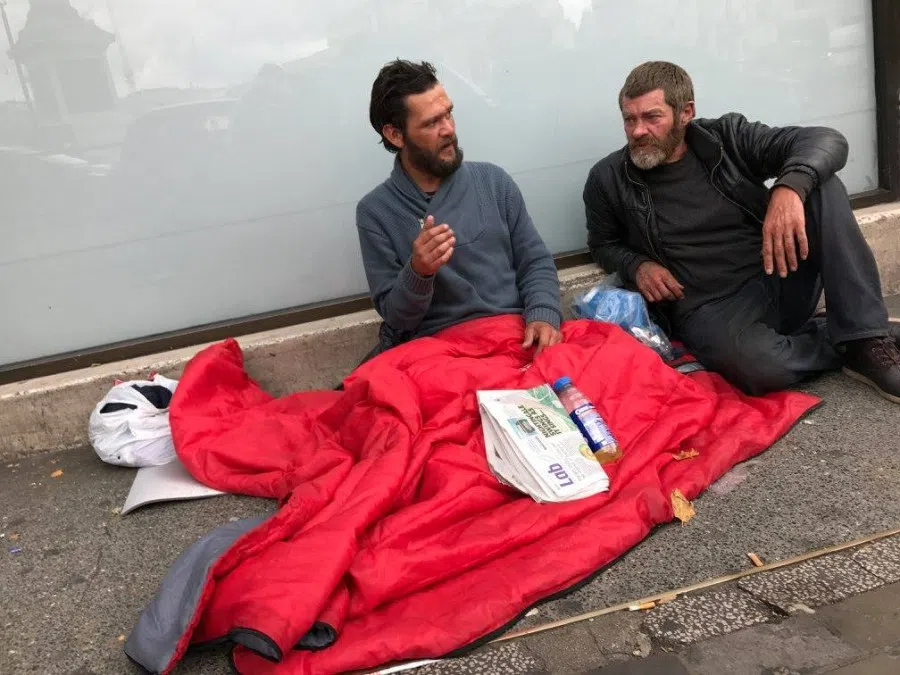 Two men on a street in London, 2017. (Candice Chan)