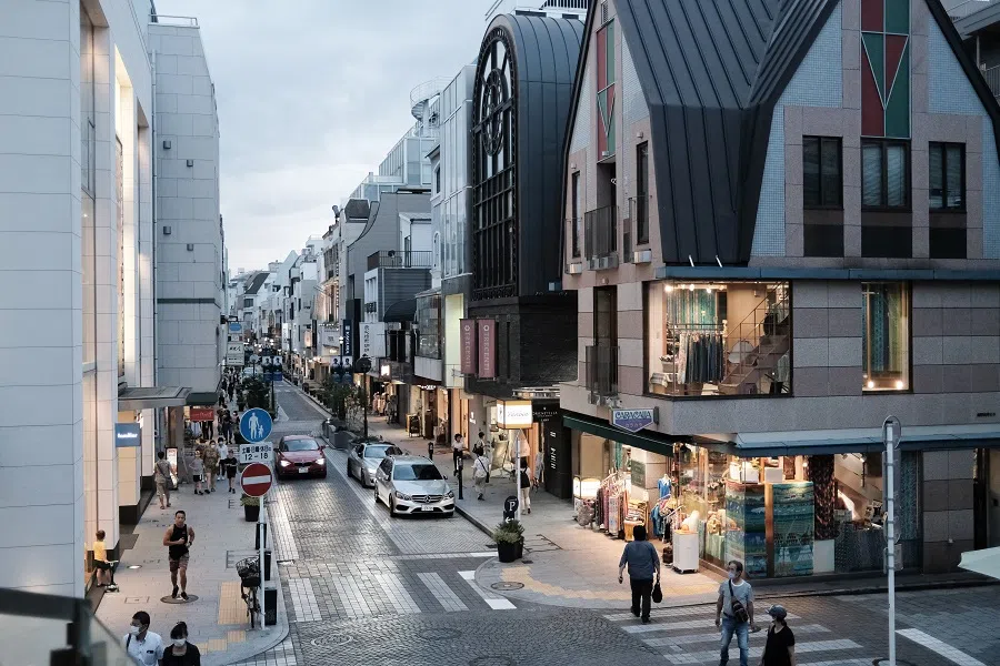 Pedestrians walk along a shopping street in the Motomachi District of Yokohama, Japan, on 16 September 2020. (Soichiro Koriyama/Bloomberg)
