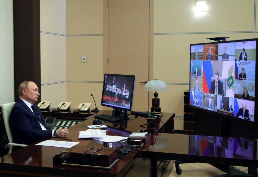 Russian President Vladimir Putin attends a meeting with government members via a video link at the Novo-Ogaryovo state residence outside Moscow, Russia, 23 March 2022. (Sputnik/Mikhail Klimentyev/Kremlin via Reuters)