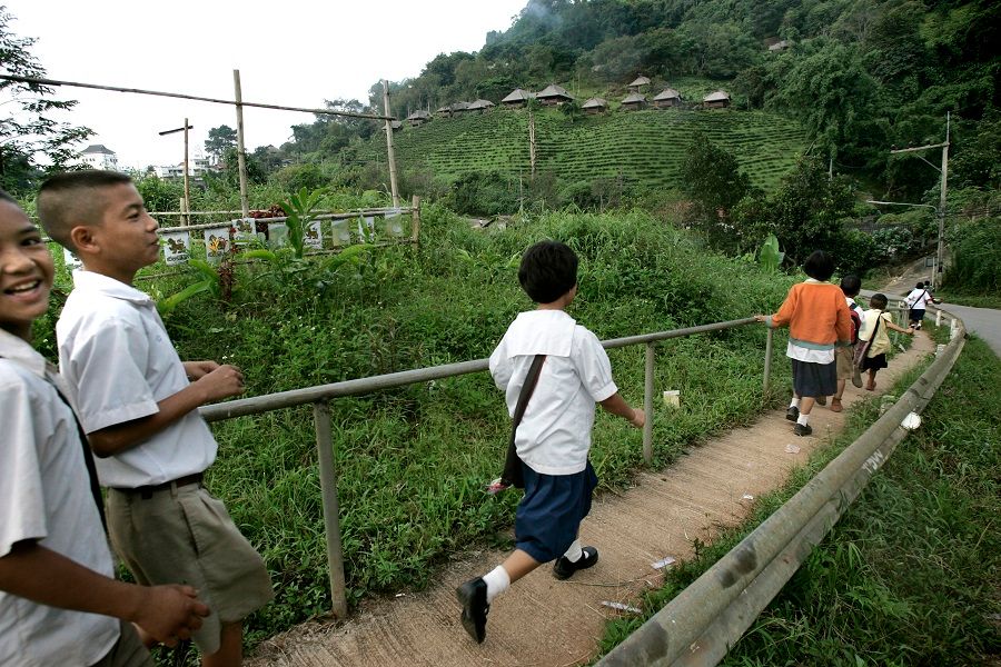 Students walk to school across the hilly terrain of Mae Salong, a KMT Chinese village, in Chiang Rai, Northern Thailand. (SPH Media)