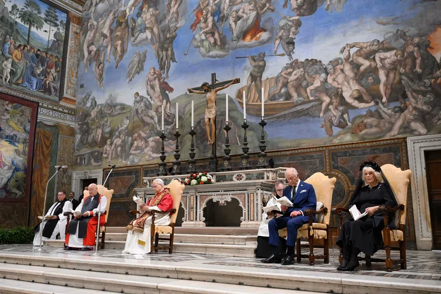 This photo taken and handout on 23 October 2025 by Vatican Media shows Britain's King Charles III and Queen Camilla during an Eucumenical prayer led by Pope Leo XIV in the Sistine Chapel in the Vatican. (Handout/Vatican Media/AFP)