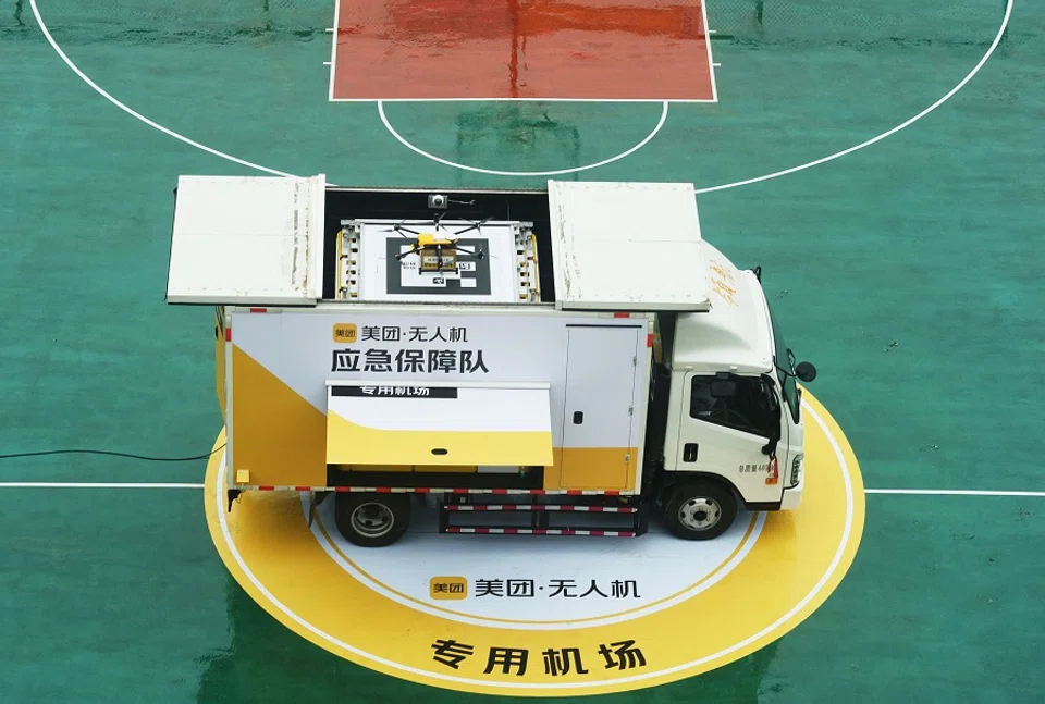 A delivery drone, transporting samples to be tested for the Covid-19 coronavirus, lands at a testing facility in Hangzhou in China's eastern Zhejiang province on 24 May 2022. (AFP)