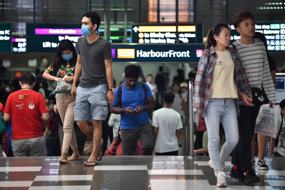 People wearing masks at VivoCity near HarbourFront MRT station in Singapore on 24 Jan 2020. (SPH)