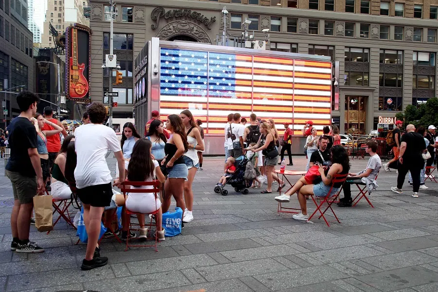 People visit Times Square in New York, US on 2 August 2024. (Leonardo Munoz/AFP)