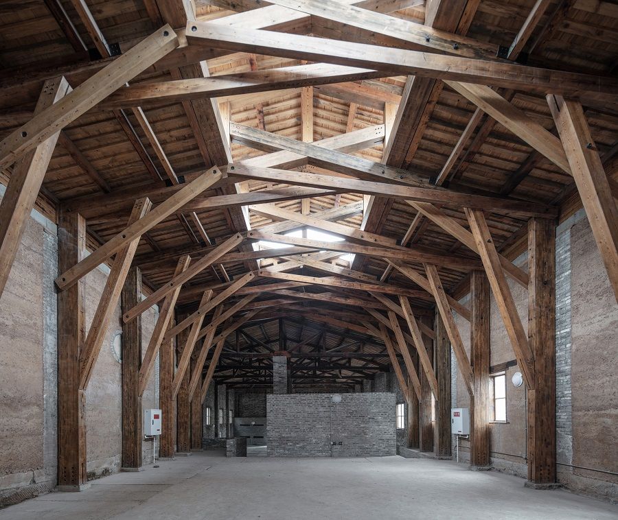 Chang Yung Ho, Forbidden City College, Chongqing, 2020. The original architecture has been preserved by rebuilding the damaged structure with wood trusses. (Photo: DID STUDIO)