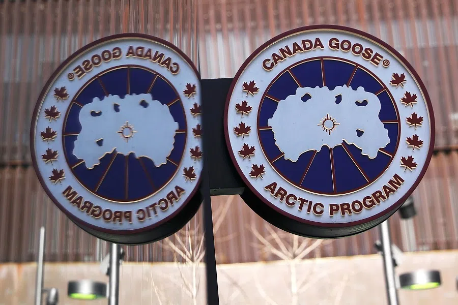 A Canada Goose logo is seen at its store in Beijing, China, 2 December 2021. (Tingshu Wang/Reuters)