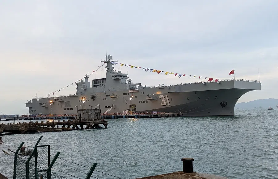 The Chinese People’s Liberation Army (PLA) Navy formation, Type 075 amphibious assault ship, Hainan is docked at the China Merchants Wharf in Hong Kong on 24 November 2024, as part of a publicity visit. (Holmes Chan/AFP)