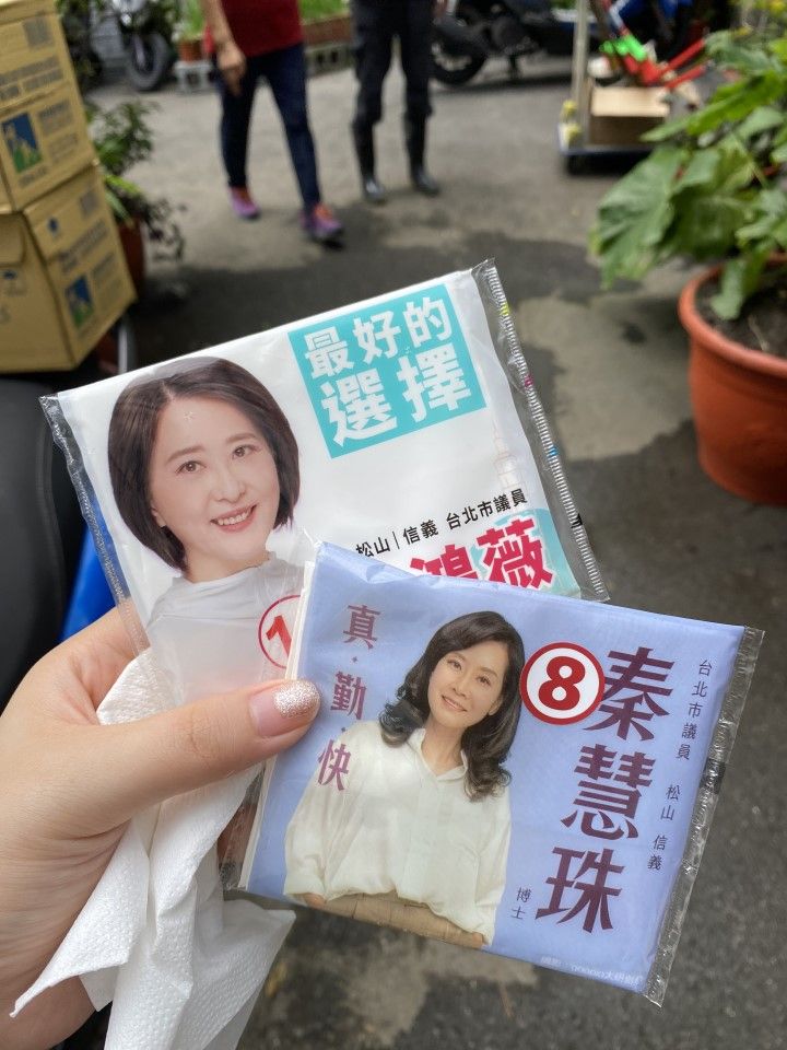 Taiwan election candidates can often be seen walking through wet markets and residential neighbourhoods handing out leaflets, tissue packets (pictured) and surgical masks with their faces printed on them. (SPH Media)