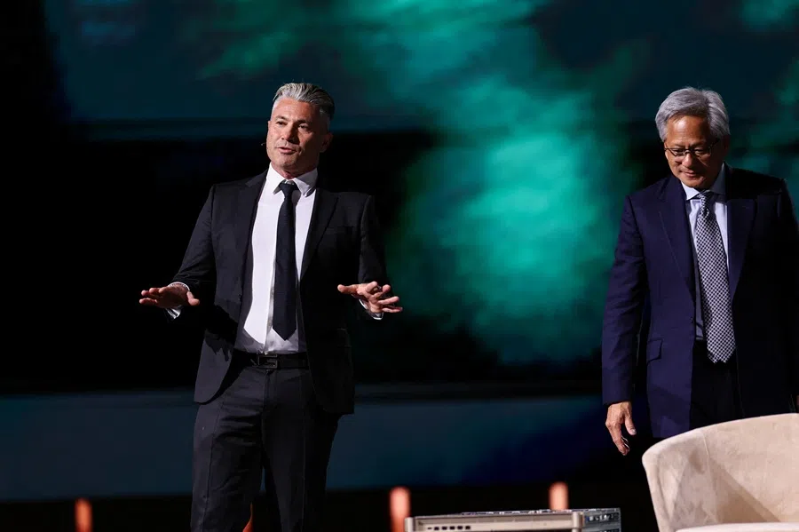 Tareq Amin (left), CEO of HUMAIN, and Jensen Huang, CEO of Nvidia, attend the Saudi-US Investment Forum, in Riyadh, Saudi Arabia, on 13 May 2025. (Hamad I Mohammed/Reuters)