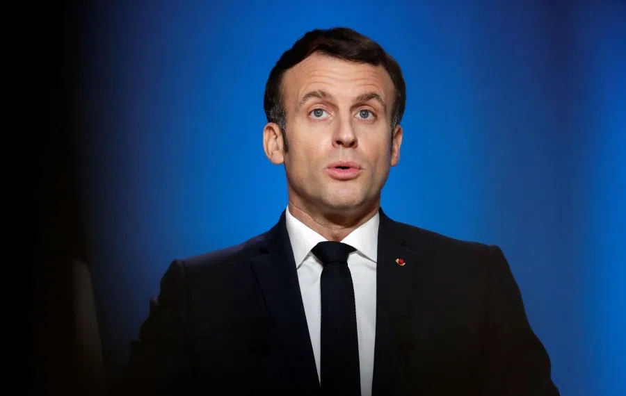 French President Emmanuel Macron holds a news conference at the end of a EU leaders summit, in Brussels, Belgium, 11 December 2020. (Olivier Hoslet/Pool via REUTERS)