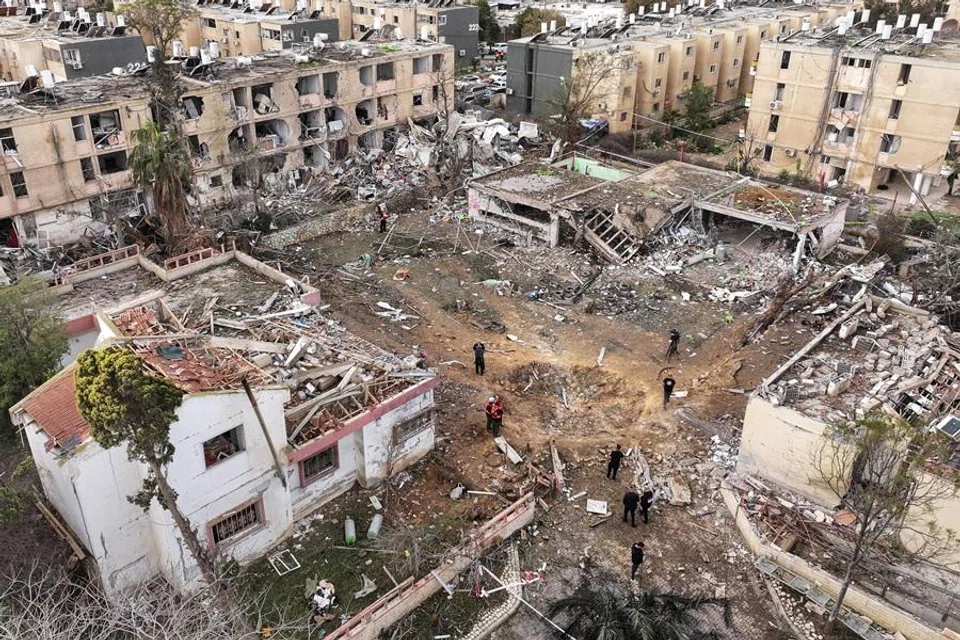 A drone view shows damage in a residential neighbourhood, following a night of Iranian missile strikes which injured dozens of Israelis, amid the US-Israel conflict with Iran, in Dimona, southern Israel, on 22 March 2026. (Roei Kastro/Reuters)