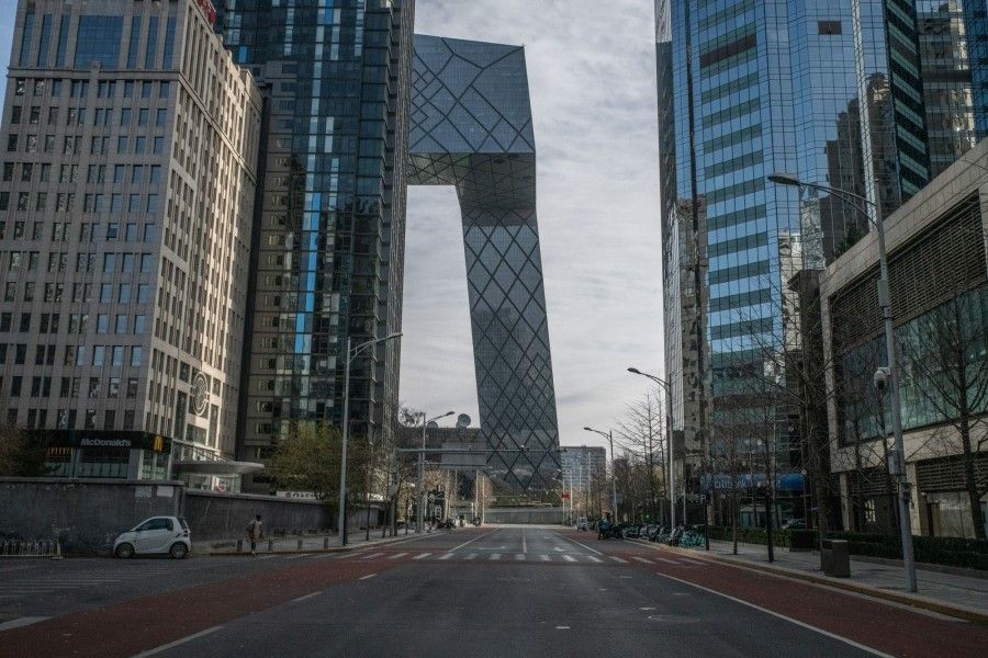 A deserted road in the central business district in Beijing, China, on 29 November 2022. (Bloomberg)