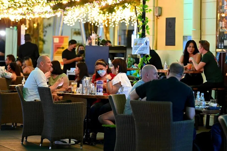 People dining outside a restaurant at Clarke Quay, Singapore, on 8 January 2022. (SPH Media)
