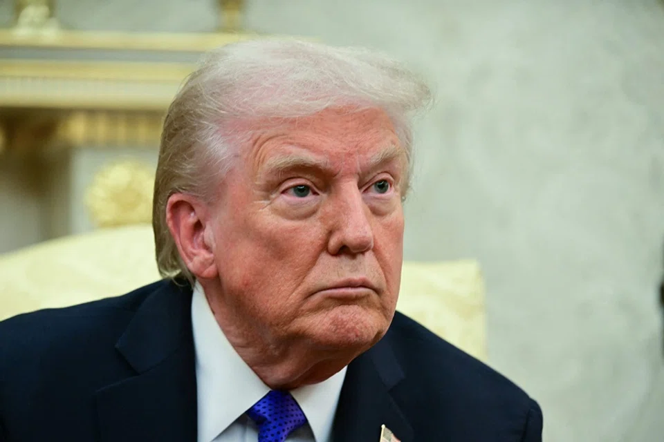 US President Donald Trump looks on during a meeting in the Oval Office of the White House in Washington, DC, on 22 October 2025. (Jim Watson/AFP)