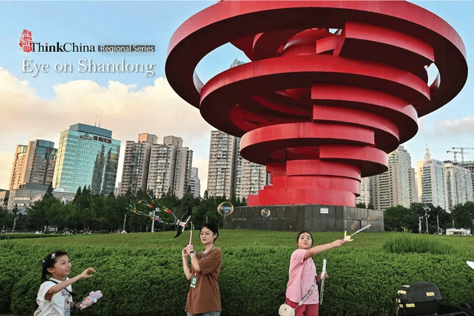 People play with soap bubbles at the May Fourth Plaza in Qingdao, China’s eastern Shandong province, on 25 July 2025. (Adek Berry/AFP)
