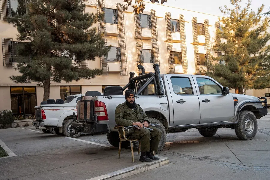 An Afghan security personnel is pictured at the entrance gate of the Kabul Serena Hotel renamed as the Kabul Grand Hotel, in Kabul, on 5 February 2025. (Wakil Kohsar/AFP)