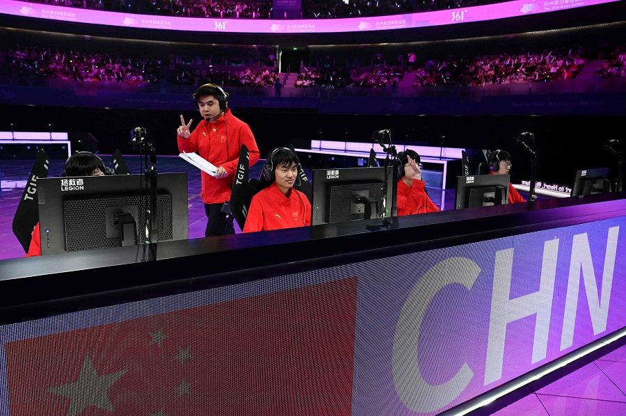 China's team prepares to compete in the League of Legends semi-final e-sports event against South Korea in Hangzhou, Zhejiang province, China, on 28 September 2023. (Wang Zhao/AFP)