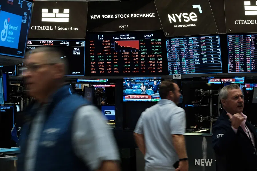 Traders work on the floor of the New York Stock Exchange (NYSE) on 26 August 2022 in New York City, US. (Spencer Platt/Getty Images/AFP)