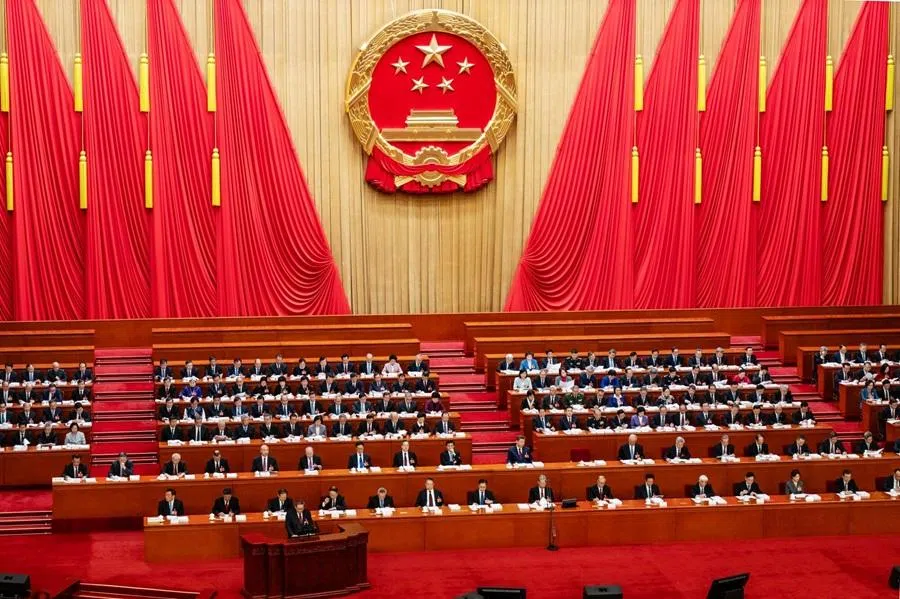 Li Qiang, China's premier, foreground, speaks during the opening session of the National People’s Congress at the Great Hall of People in Beijing, China, on 5 March 2026.