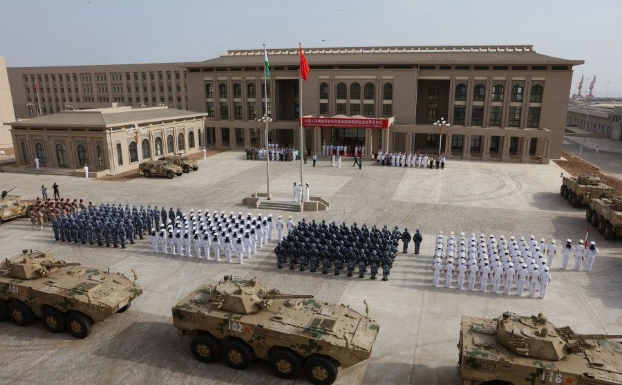 This photo taken on 1 August 2017 shows Chinese People's Liberation Army personnel attending the opening ceremony of China's new military base in Djibouti. (AFP)