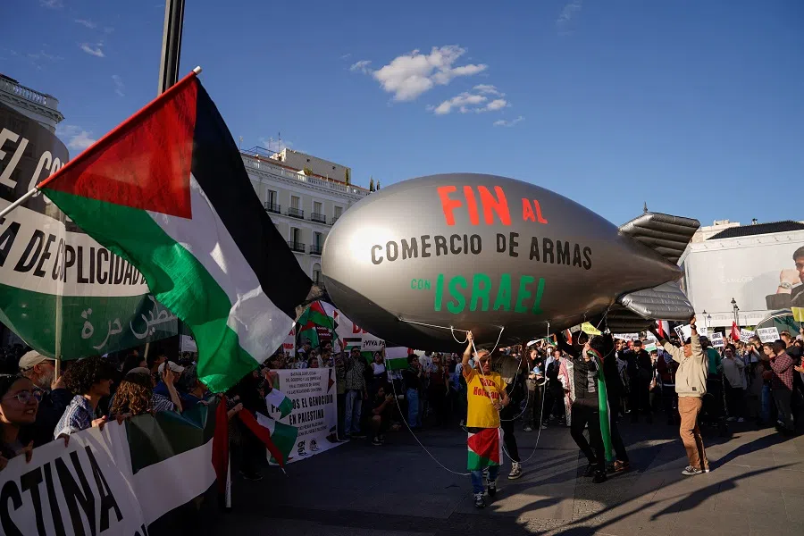 People carry a bomb-shaped balloon during a protest in solidarity with Palestinians in Gaza, in Madrid, Spain, on 18 May 2024. (Ana Beltran/Reuters)