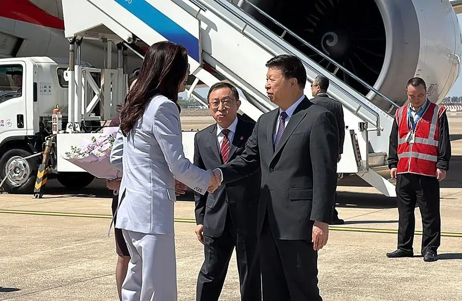 This picture taken and released by Taiwans Central News Agency (CNA) on 7 April 2026, shows Kuomintang chairperson Cheng Li-wun (left) shaking hands with Song Tao (right), director of the Taiwan Work Office of the Chinese Communist Party (CCP) Central Committee and Taiwan Affairs Office of the State Council, in Shanghai Hongqiao International Airport. (Lu Chia-jung/Central News Agency (CNA)/AFP)