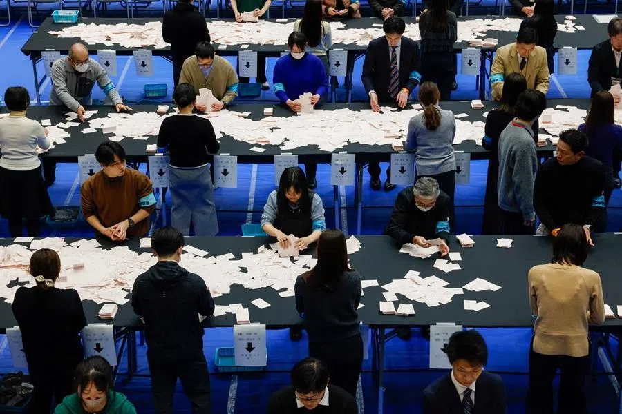 Election officials work at a ballot counting centre, on the day of the country's general election, in Tokyo, Japan, on 8 February 2026. (Manami Yamada/Reuters)