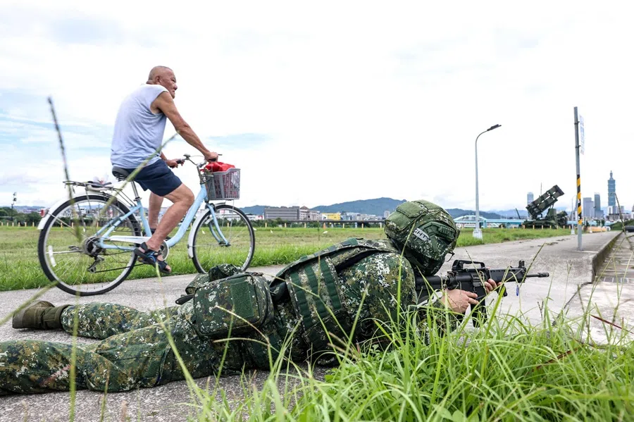 A soldier takes part in a training session during Taiwan’s annual Han Kuang military exercise next to Patriot missile systems in Taipei, Taiwan on 11 July 2025.
