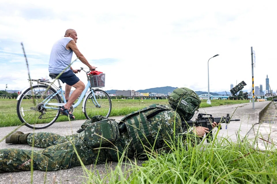 A soldier takes part in a training session during Taiwan’s annual Han Kuang military exercise next to Patriot missile systems in Taipei, Taiwan on 11 July 2025. (I-Hwa Cheng/AFP)