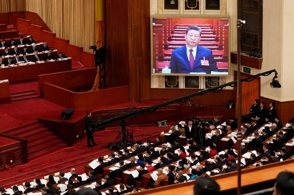 Chinese President Xi Jinping is shown on a screen during the opening session of the National People’s Congress at the Great Hall of People in Beijing, China, on 5 March 2026.  (Qilai Shen/Bloomberg)
