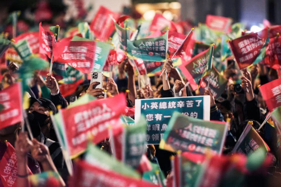 Supporters at an election night rally outside the Democratic Progressive Party's headquarters during the presidential election in Taipei, Taiwan, on 13 January 2024. (An Rong Xu/Bloomberg)