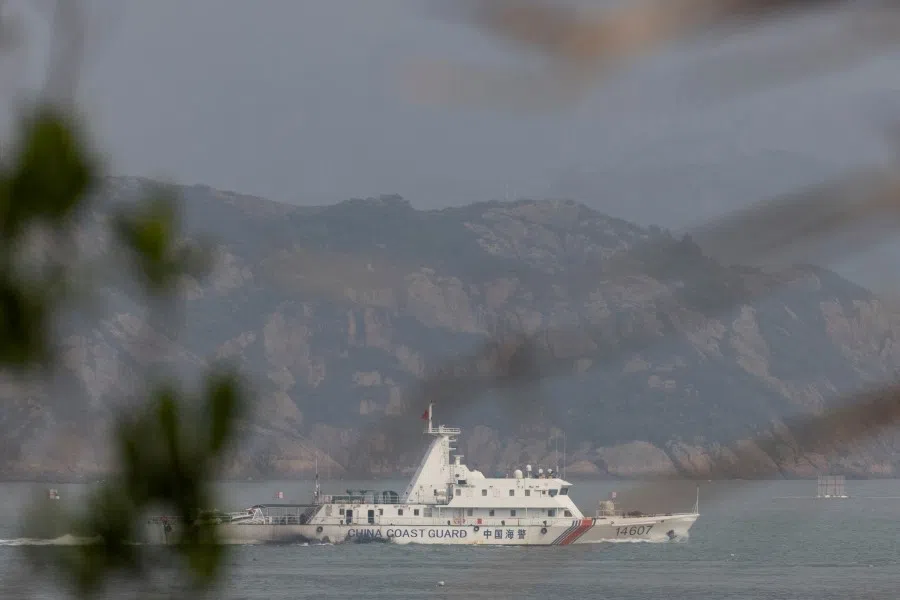 A Chinese coastguard ship sails during a military drill near Fuzhou, Fujian Province, near the Taiwan-controlled Matsu Islands that are close to the Chinese coast, China, on 8 April 2023. (Thomas Peter/Reuters)