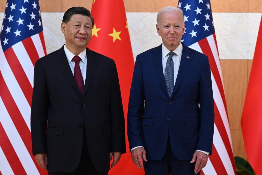 US President Joe Biden (right) and China's President Xi Jinping (left) meet on the sidelines of the G20 Summit in Nusa Dua on the Indonesian resort island of Bali on 14 November 2022. (Saul Loeb/AFP)
