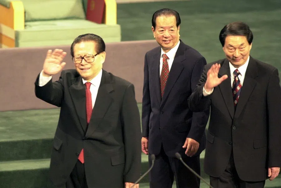 President Jiang Zemin and Chinese Premier Zhu Rongji wave as they take their leave upon conclusion of the Macau Handover on 20 December 1999.