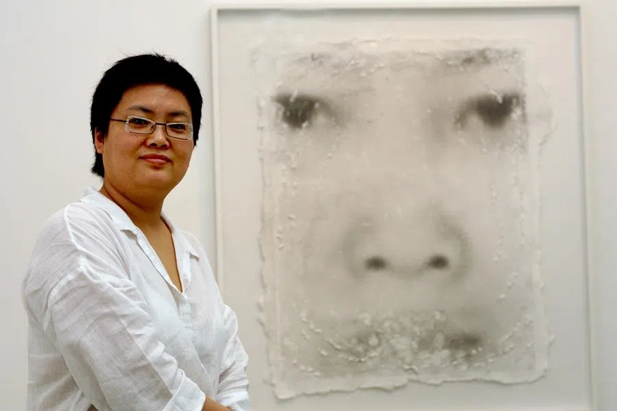 Artist Lin Tianmiao and her printmaking work. (SPH Media)
