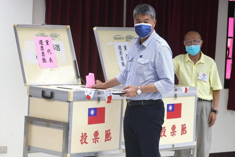 Chang Ya-Chung casts his vote for the Chairman position for Taiwan's main opposition party the Kuomintang (KMT) in Taipei, Taiwan, 25 September 2021. (Ann Wang/Reuters)