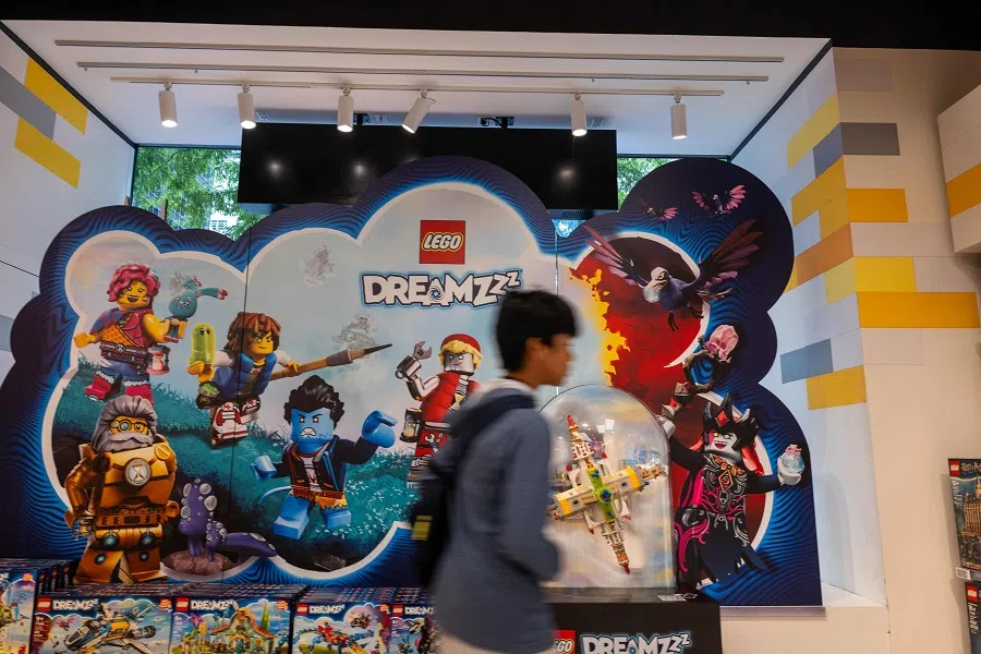 People walk through a Lego store in Manhattan on 29 August 2024 in New York City, US. (Spencer Platt/Getty Images/AFP)