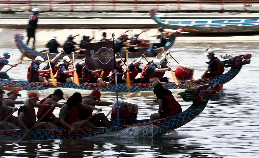 Rowers participate in a dragon boat race to celebrate the Dragon Boat Festival in Taipei on 19 June 2026.