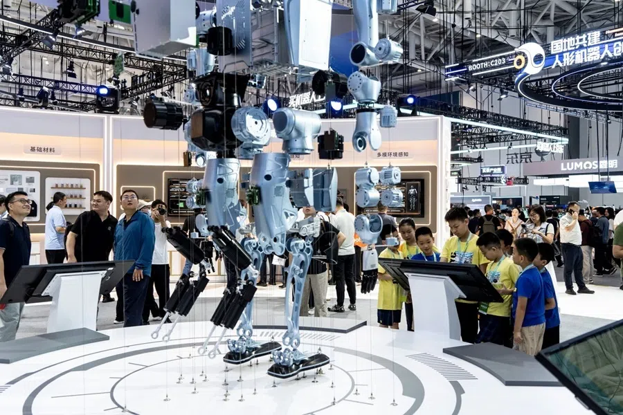Visitors at a robotics display at the exhibition of the World Robot Conference in Beijing, China, on 20 August 2026.