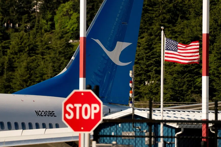 A Boeing 737 MAX 8, the first jet intended for use by a Chinese airline to be returned to its manufacturer, sits parked at Boeing Field, as trade tensions escalate over US tariffs with China, in Seattle, Washington, US, 22 April 2025. (David Ryder/Reuters)
