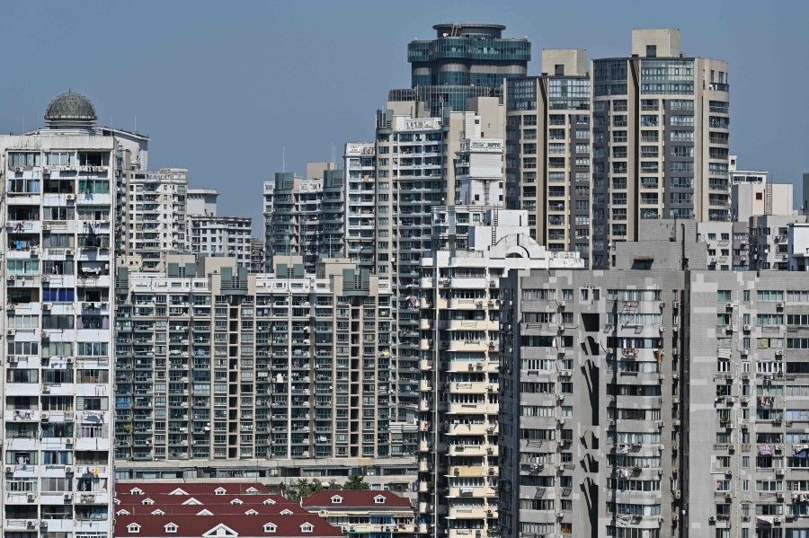 A general view shows residential buildings in Shanghai on 22 September 2021. (Hector Retamal/AFP)