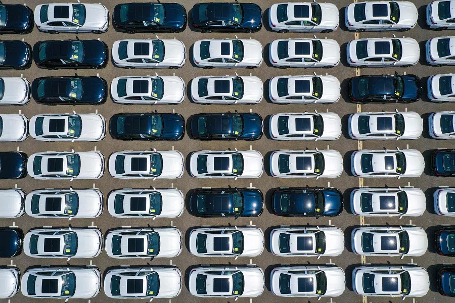 This aerial photo taken on 28 June 2024 shows newly-produced BMW cars parked at a factory in Shenyang, in China’s northeastern Liaoning province. (AFP)