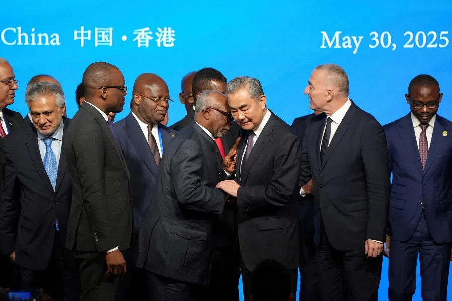 Chinese Foreign Minister Wang Yi, attends signing ceremony of Convention on the Establishment of The International Organization for Mediation in Hong Kong, China, 30 May 2025.  (Bertha Wang/Reuters)