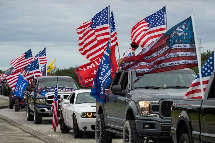 Hundreds of decorated cars and trucks with supporters of US President-elect Donald Trump participate in a Trump Victory Parade in West Palm Beach, Florida, on 17 November 2024. (Jim Watson/AFP)