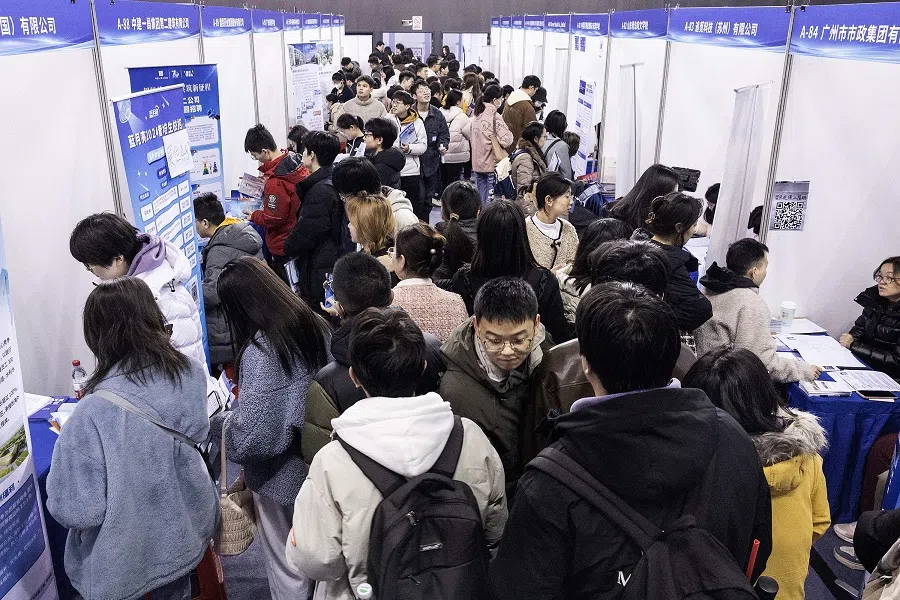 University students attend a job fair in Wuhan, in central China’s Hubei province on 6 March 2024. (AFP)
