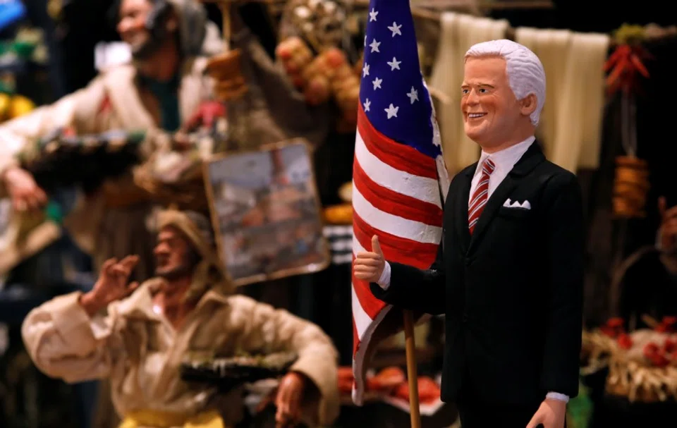 A figurine depicting U.S. President-Elect Joe Biden is pictured at a shop on Via San Gregorio Armeno, the famous street in Naples dedicated to producing nativity figurines, where shops are currently closed due to the coronavirus disease (COVID-19) restrictions, in Naples, Italy, 19 November 2020. (Ciro De Luca/REUTERS)